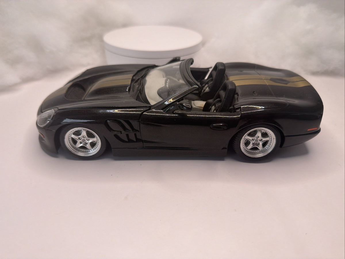 BURAGO 1999 SHELBY SERIES 1  1/18 SCALE DIE CAST BLACK And Gold Light Danage0