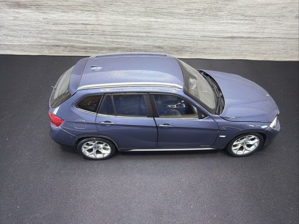 BMW X1 E84, 1:18 Scale Die-Cast Mode Blue , Kyosho  Mirror Damage No Box1