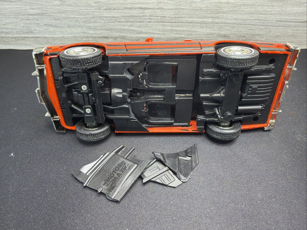Motor Max 1974 Ford Maverick 1/24 Diecast Model Underneath Damage14