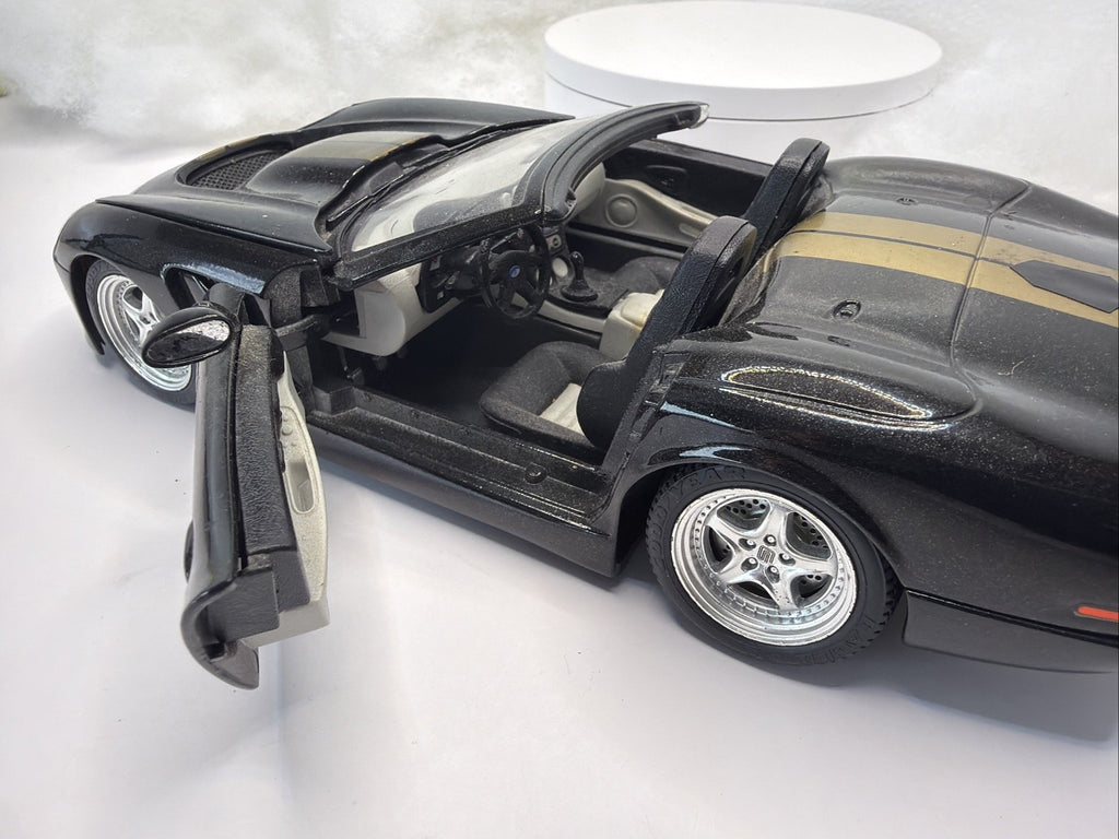 BURAGO 1999 SHELBY SERIES 1  1/18 SCALE DIE CAST BLACK And Gold Light Danage3